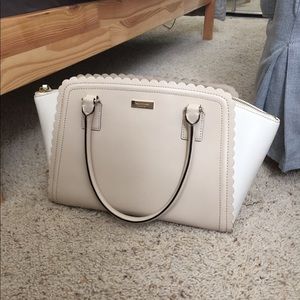 White and cream color Kate spade handbag